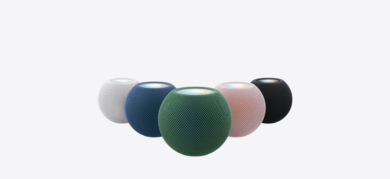 HomePod mini 2，展示全部五款顏色：白色、粉紅色、綠色、藍色及午夜暗色