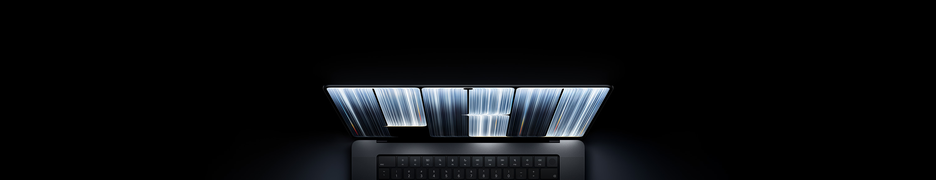 MacBook Pro with PROLED XDR Display, space black color, screen shows ribbonlike objects densely patterned with glowing stripes of various widths, spelling the word Pro.