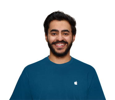 Apple-asiantuntija paidassa, jossa on Apple-logo