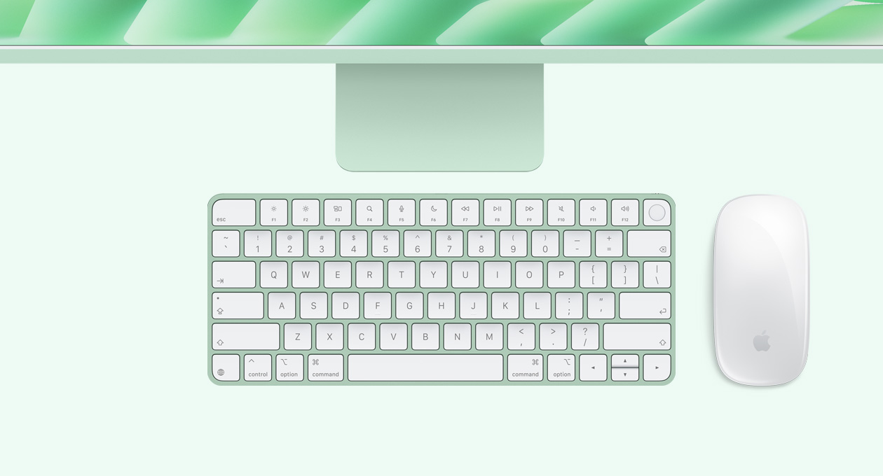 iMac, green color, top exterior, with Magic Mouse and Magic Keyboard with Touch ID