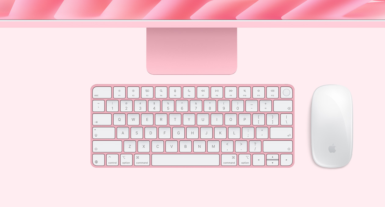 iMac, pink color, top exterior, with Magic Mouse and Magic Keyboard with Touch ID