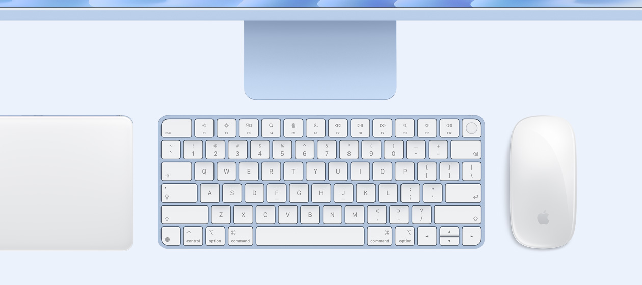 iMac, top exterior, blue color, color-matching Magic Trackpad, Magic Mouse, and Magic Keyboard with Touch ID