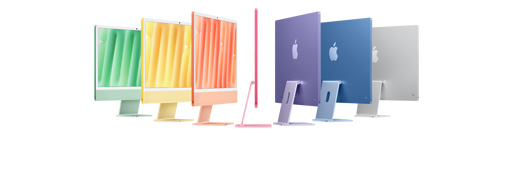 Seven iMac models in colors green, yellow, orange, pink, purple, blue, and silver, in an accordion arrangement